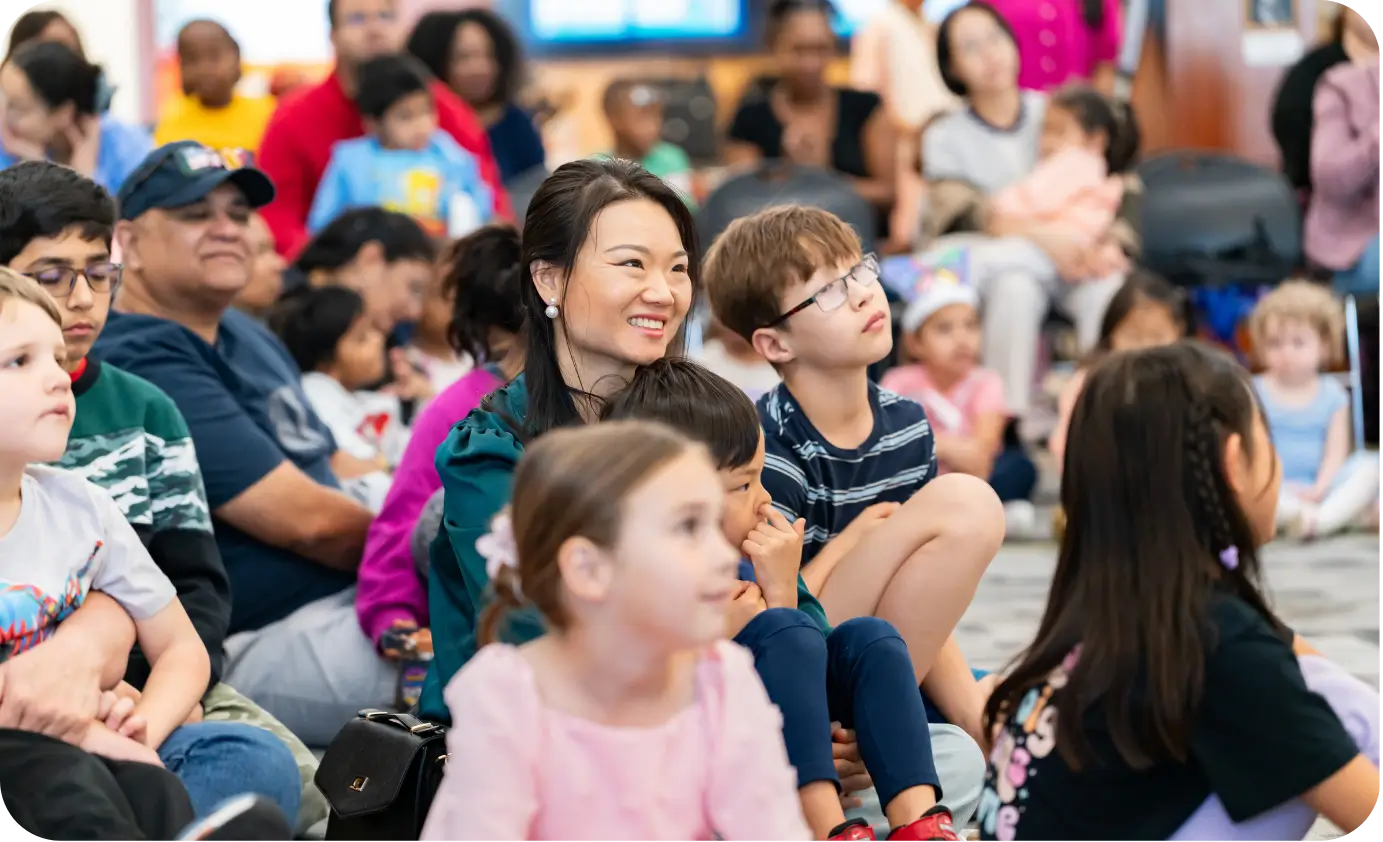 Neighbors gathering during a community library activity