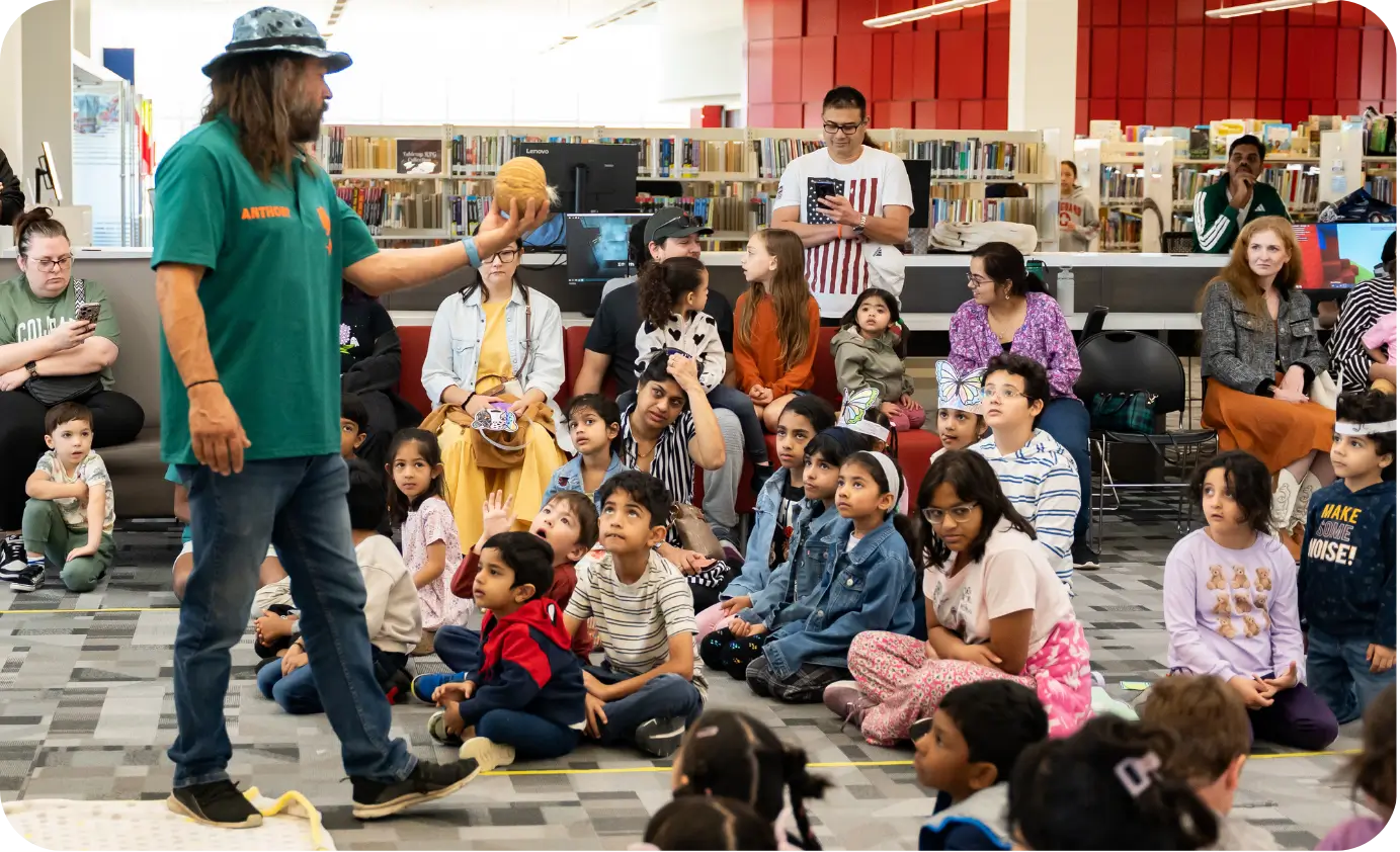 Children and families participating in a McKinney library program